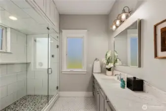 Steam shower and one of two separated vanaties.