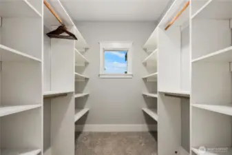 One of two large walk in closets with ample storage space.