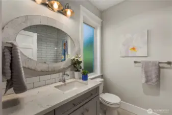 Full en suite bathroom off the second bedroom on the first floor.