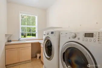 Deluxe laundry area on the main floor. Large washer & dryer are included.