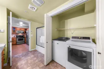 In unit, full sized washer and dryer.