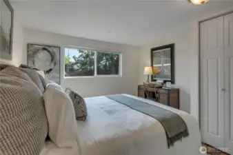 Bedroom #1: Tucked into the rear of the home for privacy, it overlooks the backyard and has a desk or large dresser nook.