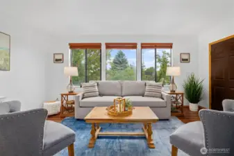 Large windows flood the space with natural light & show off territorial views.