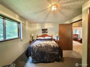 3rd Bedroom Has Slider to covered area where the hot tub is !