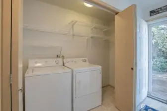 Utility/storage closet. Washer and dryer stay.