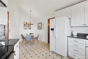 Informal dining in the kitchen - the door to the garage is just beside the fridge