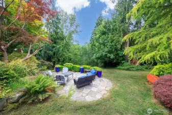 Enjoy complete privacy in your peaceful park-like yard.