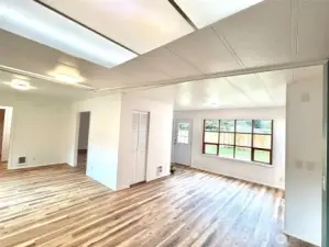 Dining and living areas.  Additional pantry