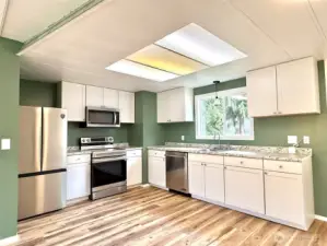 Kitchen with new appliances and cabinets