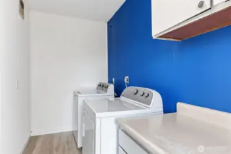 Laundry Room shared between upper two units A & B.