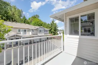 Step onto the private deck, offering a seamless indoor-outdoor living experience.