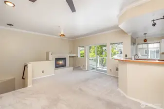 A spacious and inviting living room, complete with a modern electric fireplace for cozy evenings.