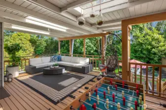 Step out onto the second-floor covered balcony—a peaceful extension of the home that invites you to enjoy morning coffee or evening sunsets with sweeping views and fresh air in every season.