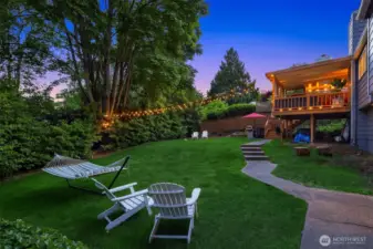 Outside the balcony, find a quaint backyard haven with a blend of greenery and hardscape. Ideal for unwinding after a long day, it’s a picture-perfect spot for your outdoor coffee nook or evening glass of wine.