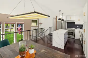 Conveniently located off the main living space, the kitchen allows easy access to the backyard for al fresco dining, while under-cabinet lighting and efficient design make it a dream for both everyday cooking and hosting.