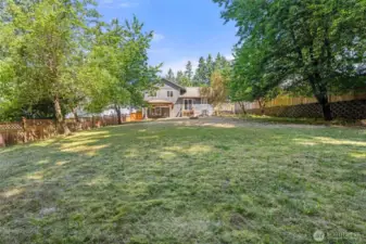 All level backyard with so many possibilities!