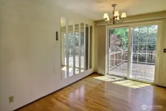 Dining space with slider to the huge backyard deck.