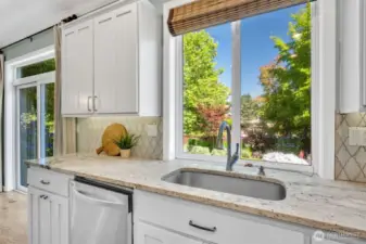 Direct views of the yard and the neighborhood park from the kitchen.