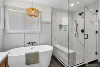 Luxuriate in the the soaking tub or walk-in shower.  Hard to choose.