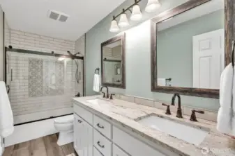 Updated guest bath with double vanity.