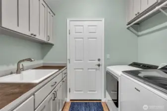 Laundry with storage & sink.  New Washer/Dryer too!