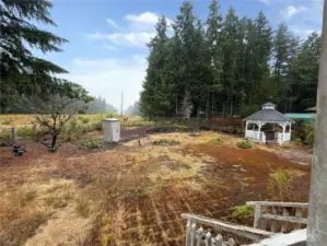 Side yard, steps from covered deck