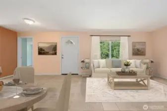 Tile floors in sandstone tones keep this living room durable and easy, and the size makes it functional instead of just filler. Light apricot-butter and amber walls add warmth, while the big picture window makes the room feel even larger. A cadet wall heater gives you custom heat on demand, and the front door’s arched glass detail adds some charm. The best part? The largest bedroom opens right here, so no one has to wander down a hallway to find it.