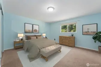 At roughly 15'x15', this bedroom gives you real square footage to work with. Mirrored closet doors double as full-length fit check central or your own dance studio. The barely-there blue walls keep it light, while warm latte carpeting makes the room feel grounded.