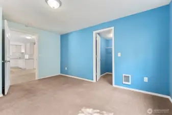 At about 14'x11', this bedroom proves it’s not the token “extra.” The scale works for a queen bed plus furniture, or skip the bed and call it your office, game room, or hobby space. Blue walls keep it light, carpet keeps it grounded, and size keeps it useful.