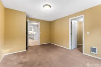 At about 14'x11', this bedroom proves it’s not the token “extra.” The scale works for a queen bed plus furniture, or skip the bed and call it your office, game room, or hobby space. Freshly painted walls keeps it clean, carpet keeps it grounded, and size keeps it useful.