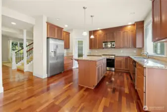 Kitchen with walk-in pantry.