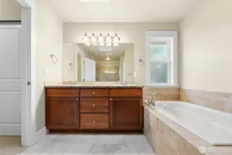 Primary bath with soaking tub.