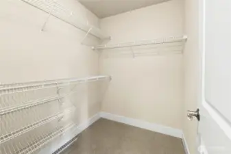 Primary walk-in closet.