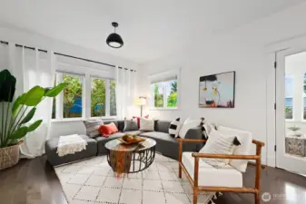 High ceilings, dark wood floors, big windows and great space to entertain.