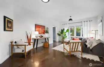 On the left is the entry to the main level den and bath and stairs to the second level.