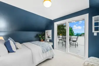 Looking Westward one has pleasant views of the Sound and Olympics from this bedroom.