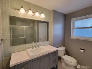 Upper level main shared bathroom.