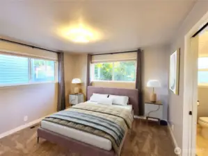 Upper level Primary bedroom with en suite bath (Staged to Scale)