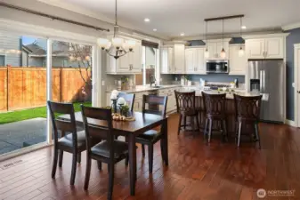 Kitchen with Eating nook and slider doors to backyard