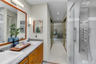 En-suite bathroom with heated floors, double vanity, double vanity, and deluxe walk in shower.