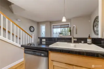 Kitchen sink overlooks the dining area