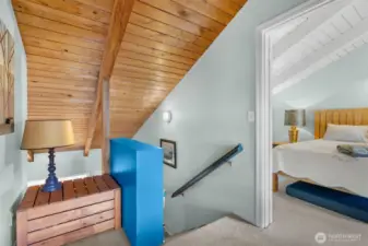 Upstairs landing offers storage and bunkbeds for guests.