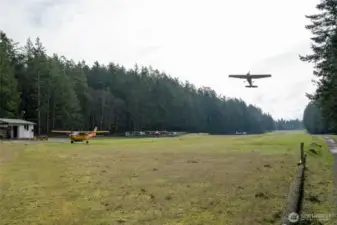 Airfield photo with mail shack on the left side. Mail and packages are delivered by San Juan airlines.