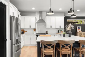 Kitchen includes updated countertops and lighting