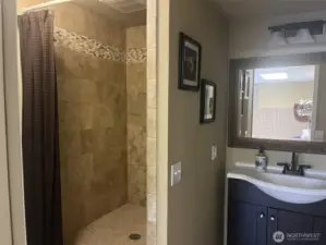 Nice walk in tile shower.
