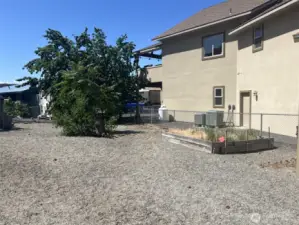 Very nice side yard with RV parking and garden area.