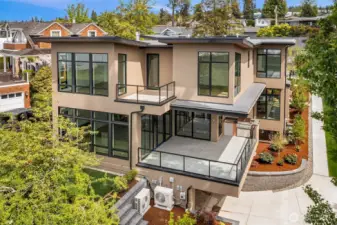 Decks off Primary and Great room create seamless indoor/outdoor living key to the Kirkland lifestyle