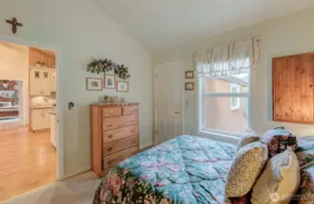 Second guest bedroom has vaulted ceiling and river view!