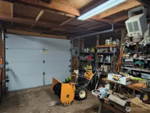 Inside 480 sq ft workshop. Snow blower is negotiable, as are many other tools and implements.