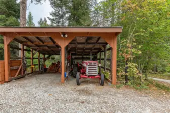 Two-bay carport prefect for storage of quads, vehicles, snowmobiles... or vintage tractors!